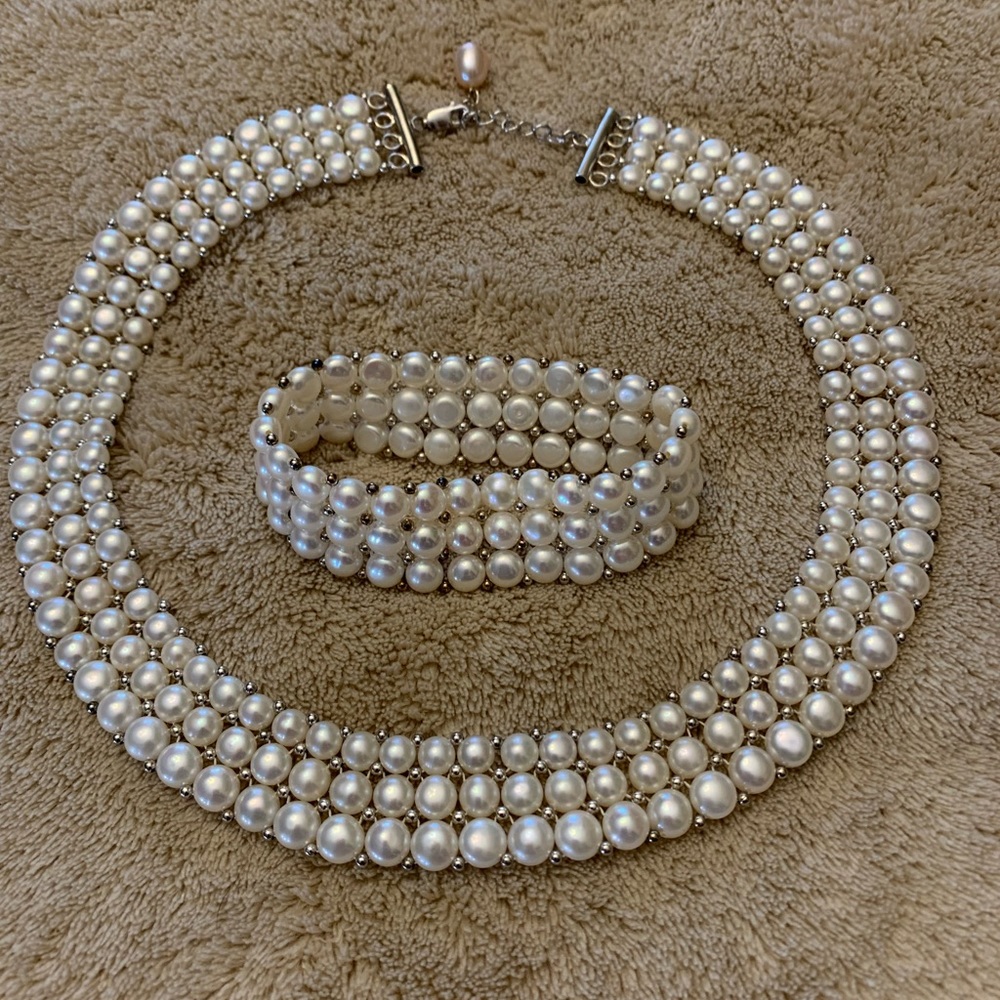 Beautiful pearl and sterling choker and stretch bracelet set.  Never worn.